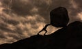 Strong man Pushing uphill Big Concrete Stone At rainy Cloudy Sky Thunder Storm . Businessman Push The Heavy Boulder up To The top