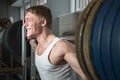 Strong man training in smith machine Royalty Free Stock Photo