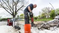 Strong man using jackhammer Royalty Free Stock Photo