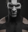 Strong men body art cross white black Royalty Free Stock Photo