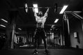 Muscular man at a crossfit gym lifting a barbell. Royalty Free Stock Photo