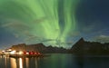 Strong Northern Lights over the Village of HamnÃ¸y, Lofoten Islands, Norway