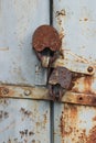 Two old reliable locks at gate of the barn