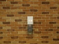 strong orange abstract brick wall install display and keypad button life or elevator