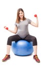 Strong pregnant woman exercising