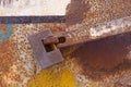 Strong rusty padlock with heavy iron bar locking metal door Royalty Free Stock Photo