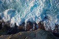 Strong sea waves hitting the stones