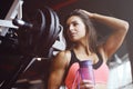 Strong athletic young girl working out in gym Royalty Free Stock Photo
