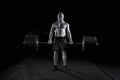 Strong man deadlifts a lot of weight Royalty Free Stock Photo