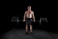 Strong man deadlifts a lot of weight Royalty Free Stock Photo