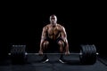 Strong man deadlifts a lot of weight Royalty Free Stock Photo