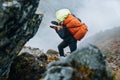 Strong Sherpa man working as porter carrying a huge cargo with traditional method on forehead. High Himalayas expedition during Royalty Free Stock Photo