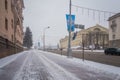 Strong snowfall, cyclone in city streets in winter Cars are cove Royalty Free Stock Photo