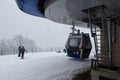 Strong snowfall in Tufandag, Gabala - Azerbaijan: 30 January 2021. Winter holiday. Skiers and cable car.