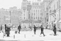 The strong snowstorm in Saint Petersburg. People walking around Sennaya square.