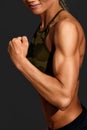 the strong sporty woman showing her muscles. Royalty Free Stock Photo