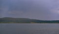 Strong summer storm. Water bubbles formed on the surface of the lake due to heavy rain Royalty Free Stock Photo