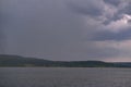 Strong summer storm. Water bubbles formed on the surface of the lake due to heavy rain Royalty Free Stock Photo