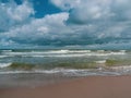 swell at the Baltic Sea and the sky is blue and cloudy