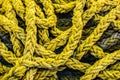 Strong vintage rope for mooring the ship at the berth. Royalty Free Stock Photo