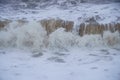 Strong waves hitting the beach