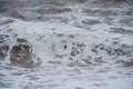 Strong waves hitting the beach