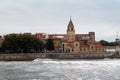 Strong waves at the sea next to a church