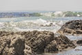 Strong waves, stones and sea cliffs, Sea Point promenade in Cape Town, South Africa