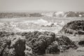 Strong waves, stones and sea cliffs, Sea Point promenade in Cape Town, South Africa