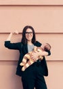 Strong Woman in Business Outfit Holding Baby Royalty Free Stock Photo