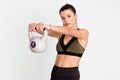 Strong woman lifting a kettlebell with two hand. Image Royalty Free Stock Photo