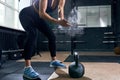 Strong Woman Lifting Kettlebells in Gym Royalty Free Stock Photo
