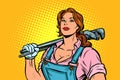 A strong woman mechanic plumber worker with adjustable wrench