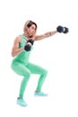 Strong woman punching with barbells in hands during boxing class Royalty Free Stock Photo