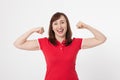 Strong woman showing her muscularity and looking at camera isolated on white. Copy space and blank shirt. Mother day