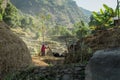 Strong woman working in the rice fields in Nepal Royalty Free Stock Photo