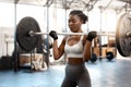 Strong, workout and barbell with black woman in gym for fitness, weightlifting and muscle. Health, challenge and Royalty Free Stock Photo
