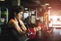 Strong young asian woman with doing exercises with barbell Royalty Free Stock Photo