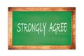 STRONGLY AGREE text written on green school board