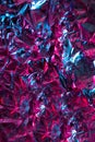 Strongly crumpled polyethylene purple color.Texture or background