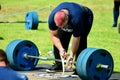 Auckland, New Zealand - Mar 2020. Strongman training in a public park, log Lift and Deadlift training Royalty Free Stock Photo