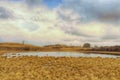 Strormy landscape of marshland in the foothills Royalty Free Stock Photo