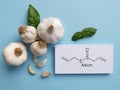 Structural chemical formula of allicin molecule with raw garlic. Health benefits of garlic, medical concept Royalty Free Stock Photo