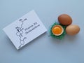 Structural chemical formula of vitamin D with fresh eggs. High vitamin D foods. Egg yolk, a natural source of vitamin D. Royalty Free Stock Photo