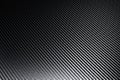 Structural detail of an industrial carbon fibre sheet in a full frame view.