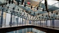 Structural glazing of the facade. Abstract background with glass ceiling elements in a modern building. view of the blue sky Royalty Free Stock Photo