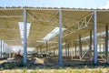 The structural steel structure of a new commercial building on reinforced concrete supports Royalty Free Stock Photo