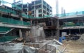 Structural work is underway at the construction site. Work is carried out in stages according to the sequence of work.