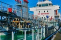 Structure and chaotic pipe system of a ship for receiving fossil fuels, with huge notice of the smoking ban at the ship bridge