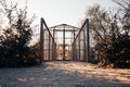 Structure in Metal and Glass Protecting Old Windmill Grinder